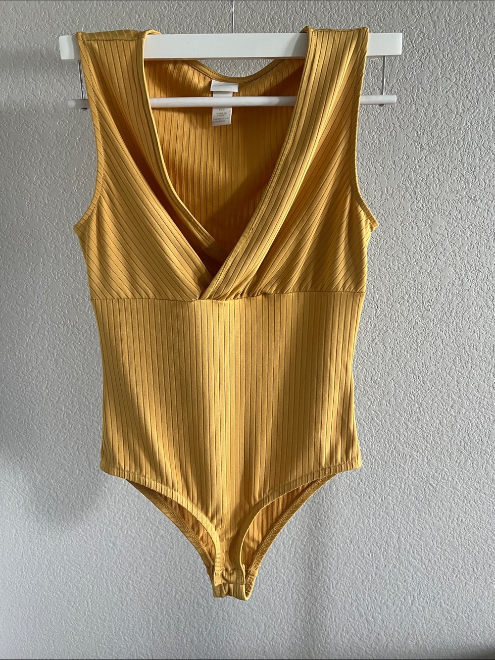 H&M Ribbed V-Neck Bodysuit in Mustard Yellow